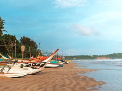 Fishing wooden boats by the ocean,Fishing boat in Sri Lanka,Fishing boats parked on the sand, fishin