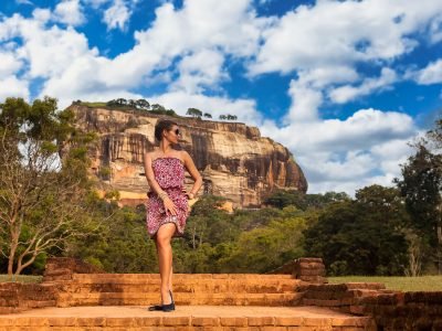 young-woman-in-sunglasses-posing-in-front-sigiriya-2023-11-27-04-50-32-utc